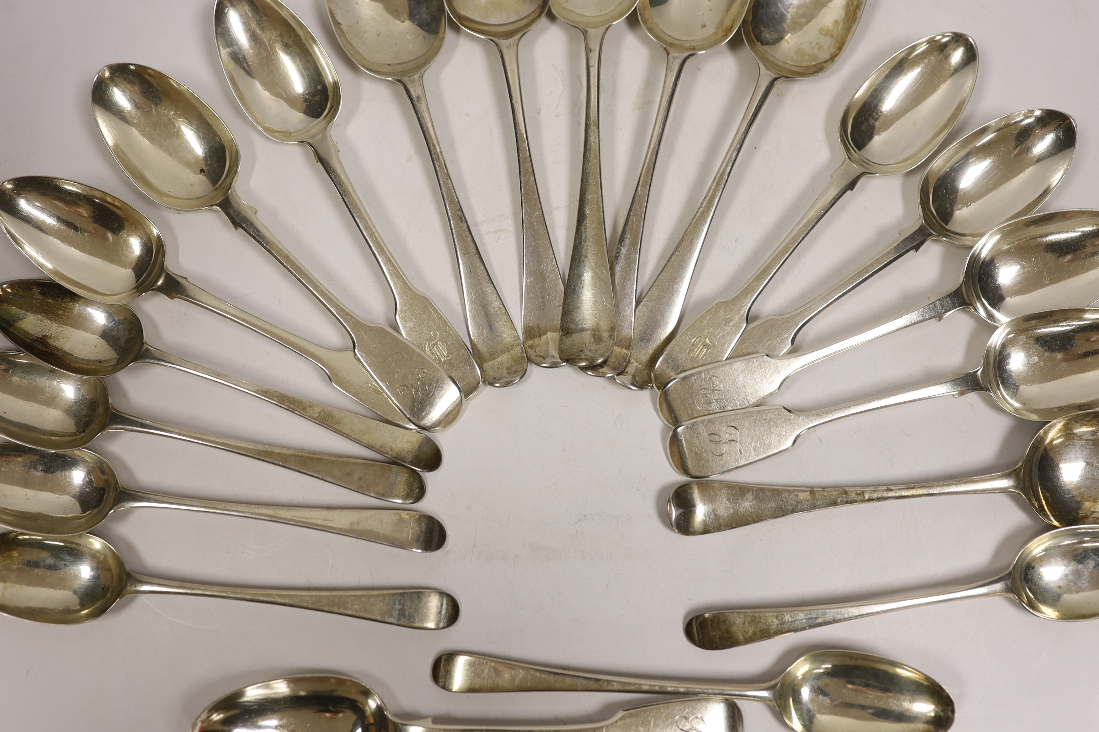 A set of five George III silver Old English pattern dessert spoons, George Smith III, London, 1776 and one other similar spoon, a matched et of six 18th century silver Hanovarian pattern dessert spoons and eight 19th cen